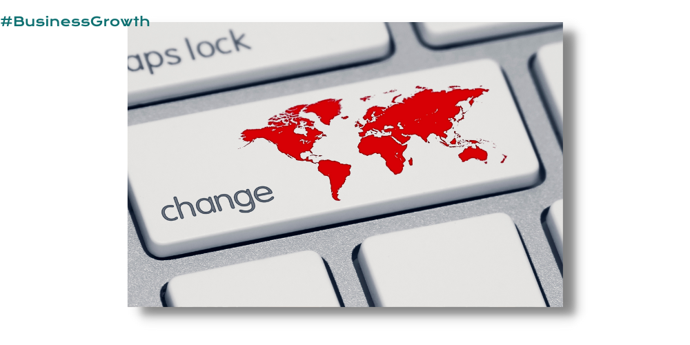 A closeup photo of a computer keyboard focused on the key below caps lock but this one says "change" and shows a map of the world.